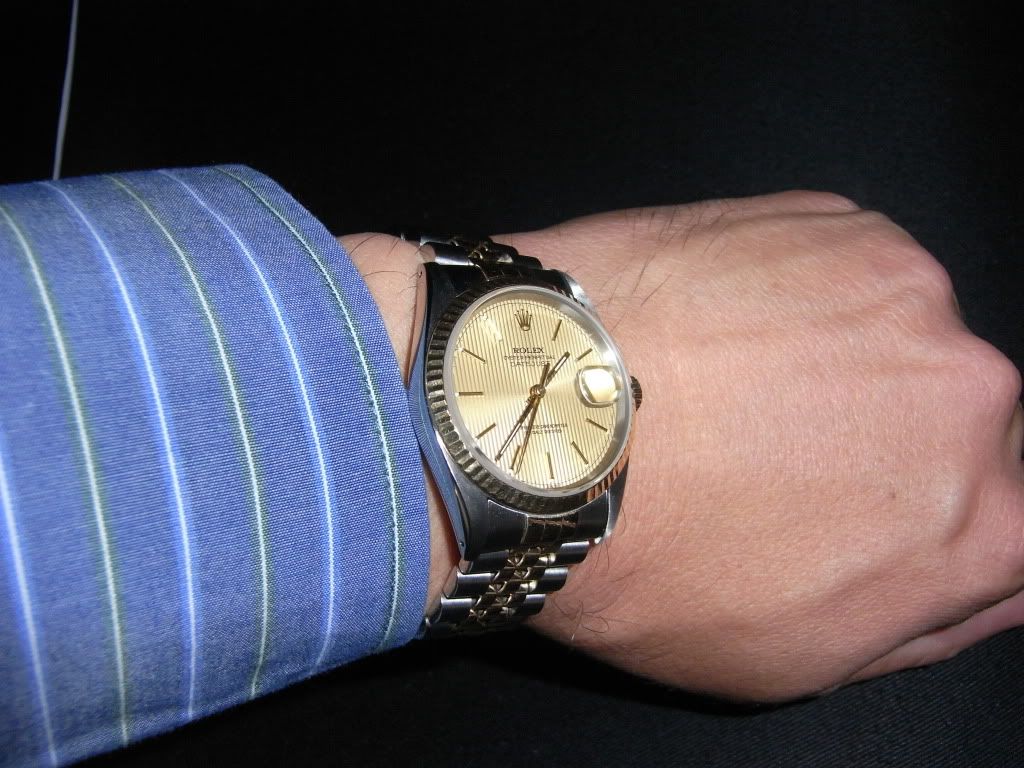 36mm rolex on man's wrist